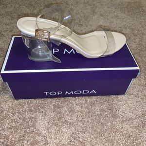 Clear heel with strap